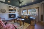 Living Room: Electric Fireplace, Cozy Rug, Smart TV